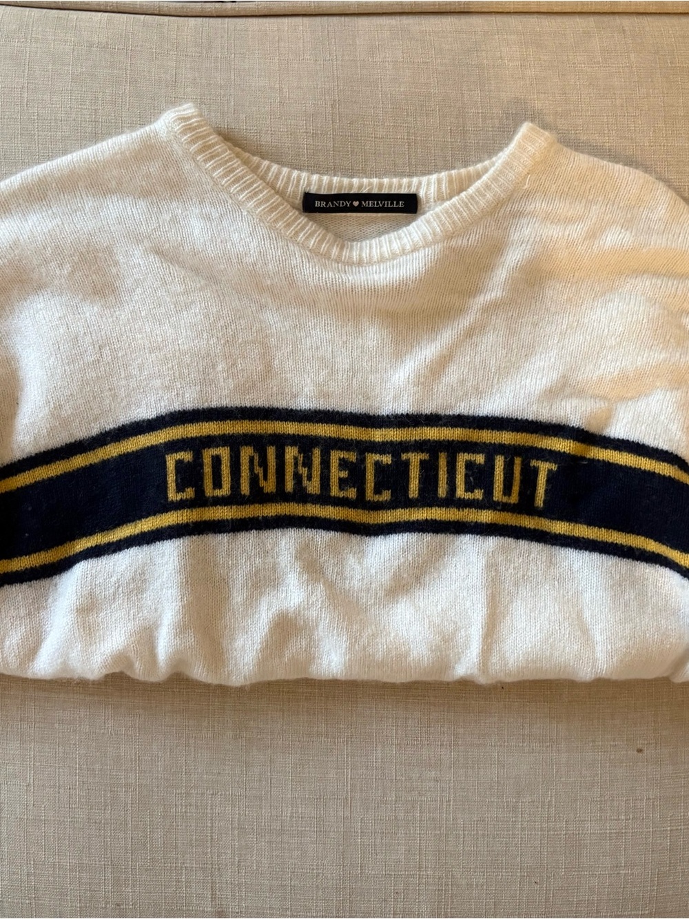 Brandy Melville White Crewneck Sweater with Navy and Gold 'CONNECTICUT' Stripe